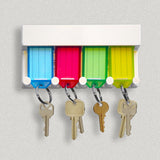 Lucky Line 4-Key Tag Rack to organize keys.  Comes with adhesive to stick to the wall or can screw in 60540